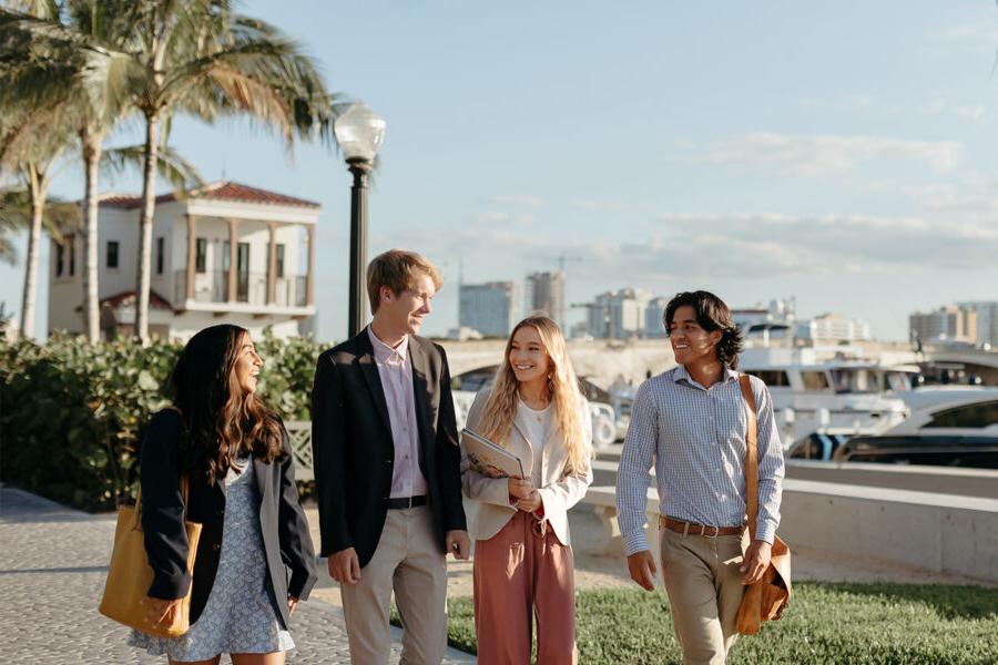 master of business administration mba students walk near the intercoastal waterway in 西<a href='http://4z7.shengmeiting.net'>推荐全球最大网赌正规平台欢迎您</a>.